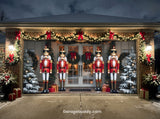 Christmas garage door cover featuring nutcrackers, wreaths, and festive lights.
