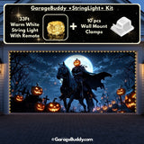 Spooky Headless Horseman garage door cover on a double-door garage, accented with glowing Halloween lights for a haunted effect.